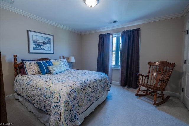 bedroom with baseboards, ornamental molding, light carpet, and visible vents