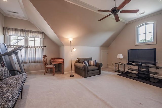 carpeted living area with baseboards, a ceiling fan, and plenty of natural light