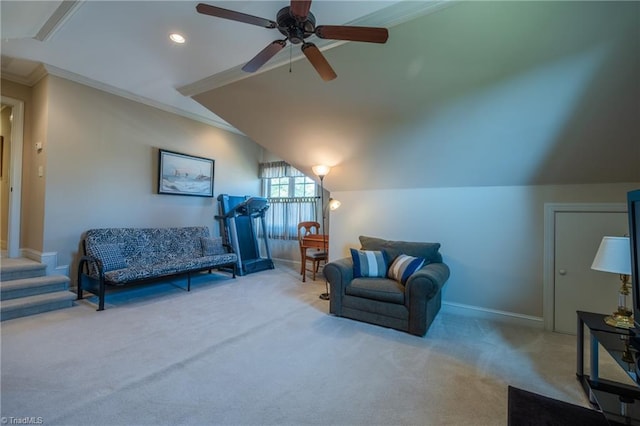 living area with carpet, a ceiling fan, baseboards, lofted ceiling, and ornamental molding