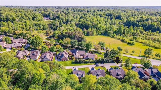 aerial view with a residential view and a forest view
