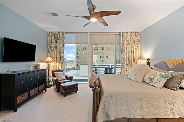 bedroom featuring carpet flooring, ceiling fan, and access to outside