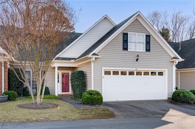 view of front of property featuring a garage