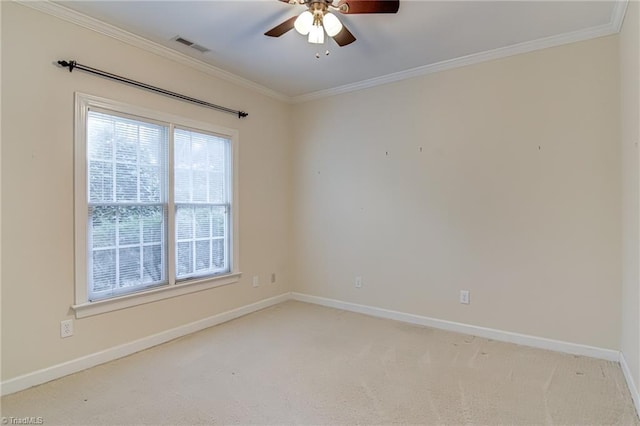 unfurnished room featuring light carpet, ornamental molding, and ceiling fan