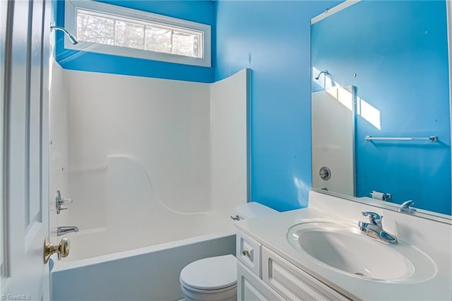 full bathroom featuring vanity, shower / bathing tub combination, and toilet