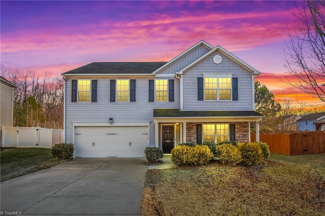 front of property with a garage