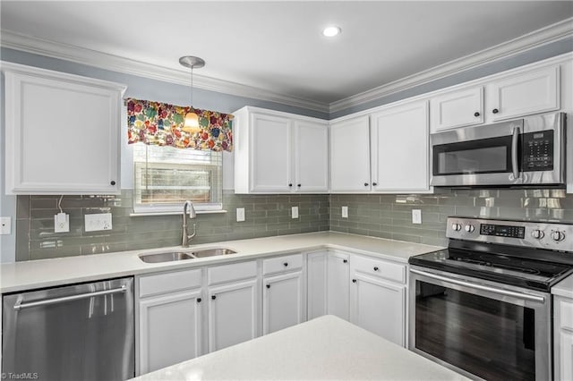 kitchen with sink, stainless steel appliances, and white cabinets