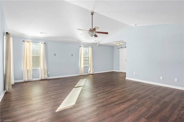 unfurnished room with ceiling fan, dark hardwood / wood-style floors, and lofted ceiling