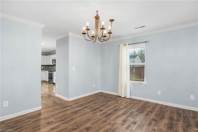 unfurnished room with dark hardwood / wood-style floors, ornamental molding, and an inviting chandelier