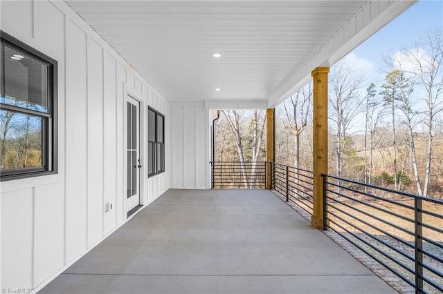 view of patio featuring a balcony