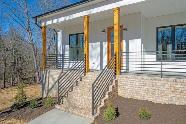 doorway to property featuring a porch