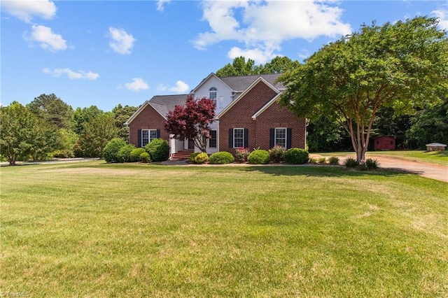 view of front facade with a front lawn