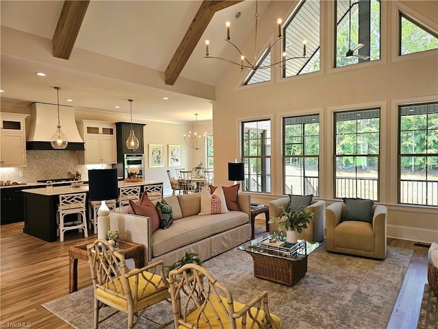 living room with plenty of natural light and wood-type flooring