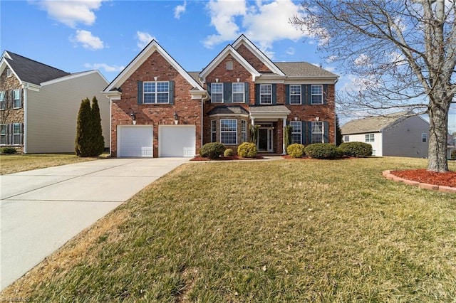 view of front of house with a front yard, brick siding, driveway, and an attached garage