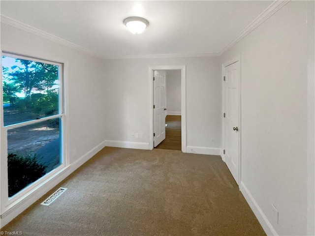 5605 Southstone Dr, Greensboro, NC 27406 - unfurnished bedroom with ornamental molding, carpet, and baseboards