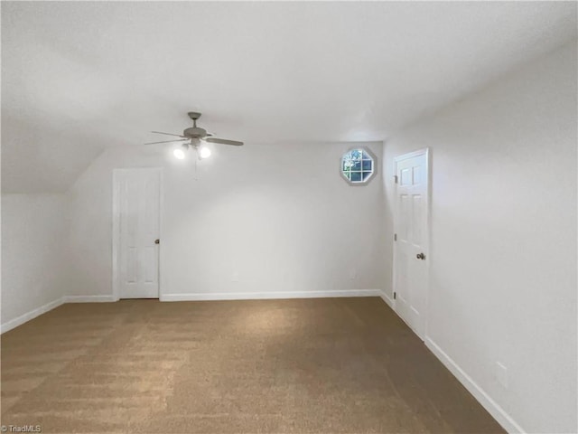 5605 Southstone Dr, Greensboro, NC 27406 - bonus room featuring a ceiling fan, carpet, baseboards, and vaulted ceiling
