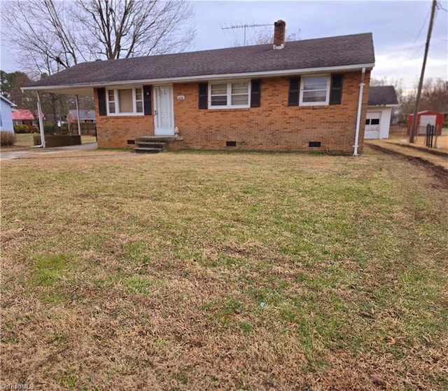 ranch-style home with a front lawn and a carport