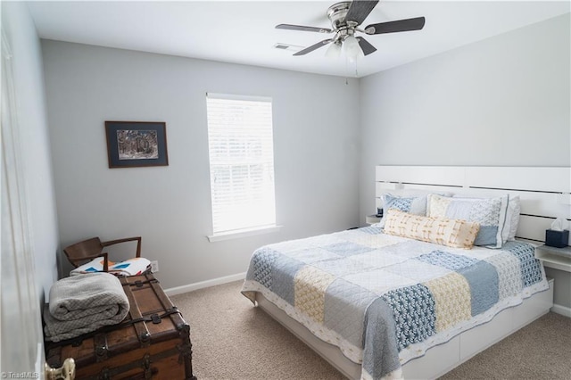 bedroom with carpet floors, baseboards, and ceiling fan