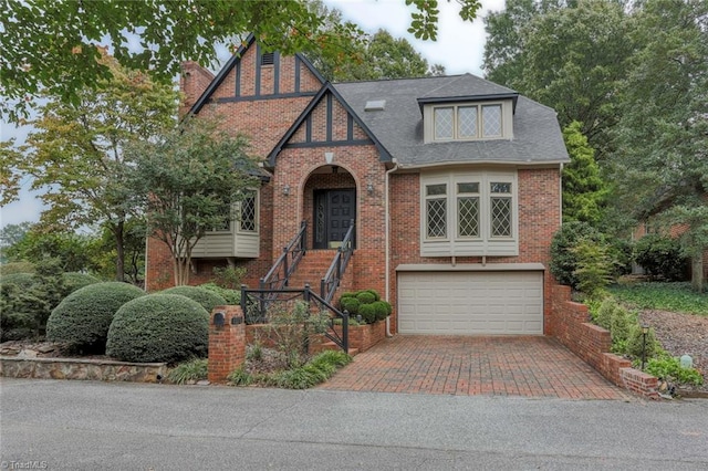 tudor home with a garage