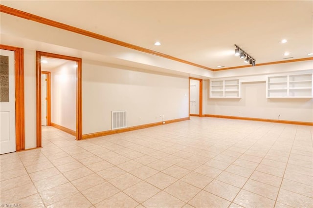 unfurnished room featuring baseboards, crown molding, visible vents, and recessed lighting