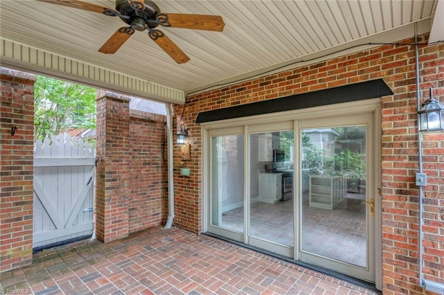 view of patio featuring ceiling fan