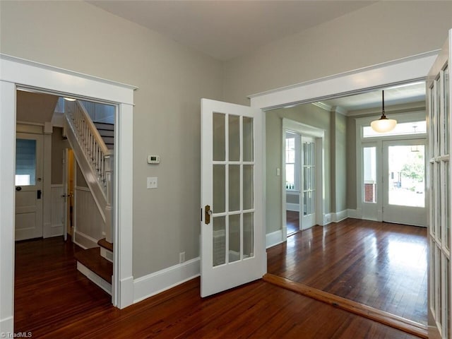 doorway to outside with french doors and dark hardwood / wood-style floors