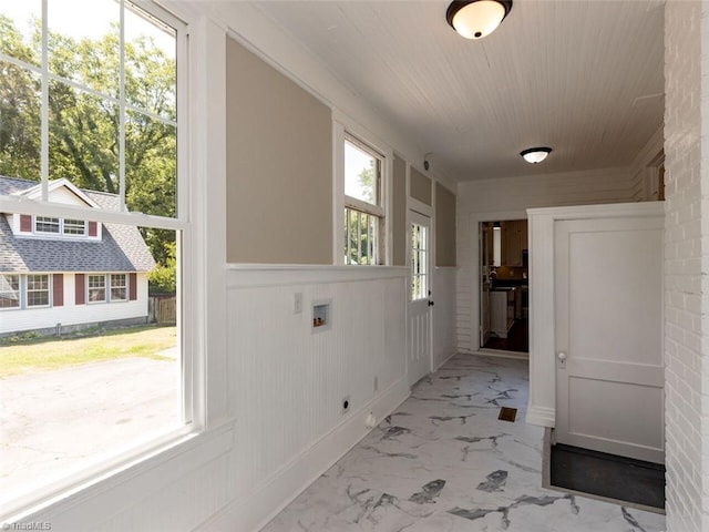 hallway with wooden walls