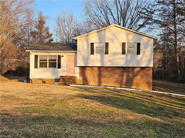 view of front of home with a front yard