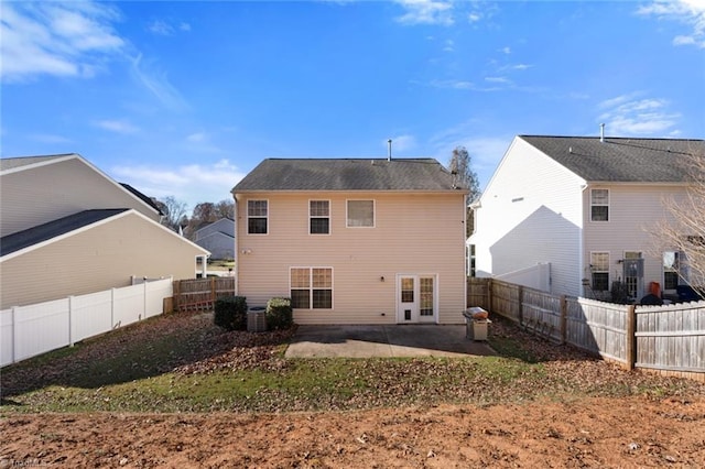 back of property featuring a patio and central air condition unit