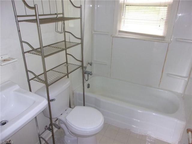 full bathroom featuring tile flooring, sink, shower / bath combination, and toilet