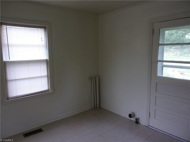 view of tiled spare room