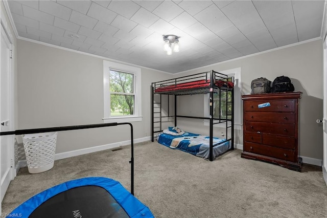 1105 Hawthorne Ln, Burlington, NC 27215 - carpeted bedroom featuring ornamental molding and baseboards
