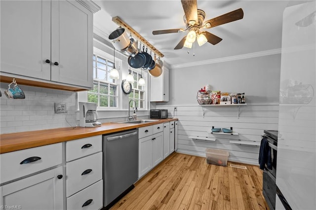 1105 Hawthorne Ln, Burlington, NC 27215 - kitchen featuring wooden counters, dishwasher, a sink, crown molding, and light wood finished floors