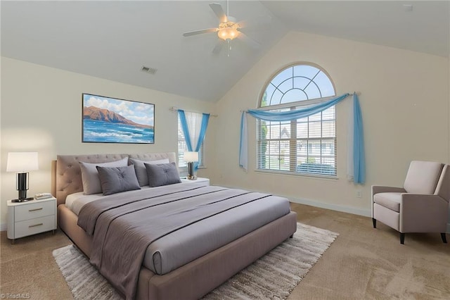 bedroom with light colored carpet, a ceiling fan, baseboards, lofted ceiling, and visible vents