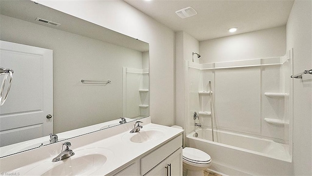 full bathroom with shower / bath combination, toilet, and vanity