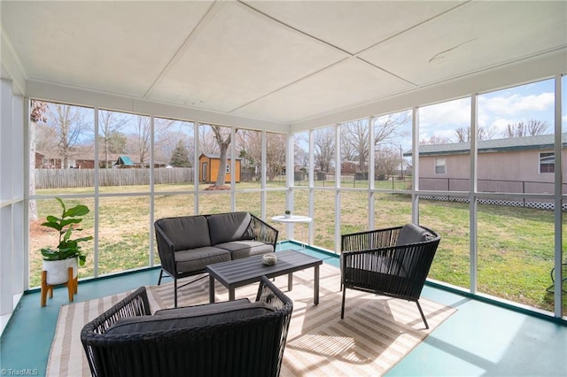 sunroom / solarium featuring a healthy amount of sunlight