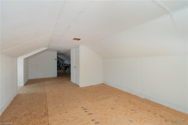 bonus room featuring vaulted ceiling