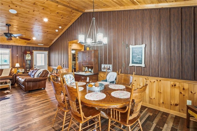 dining area featuring wooden ceiling, vaulted ceiling, wooden walls, and dark hardwood / wood-style flooring