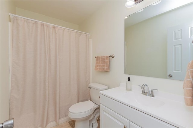 full bathroom with toilet, vanity, and a shower with shower curtain