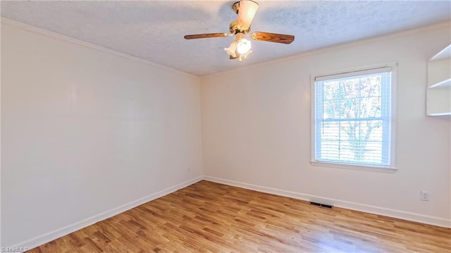 368 Shady Grove Rd, Eden, NC 27288 - unfurnished room with wood finished floors, ornamental molding, a textured ceiling, and ceiling fan