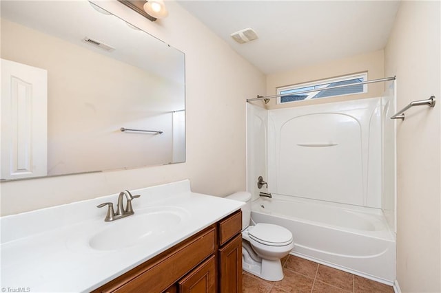 full bathroom with tile patterned floors, vanity, shower / bath combination, and toilet