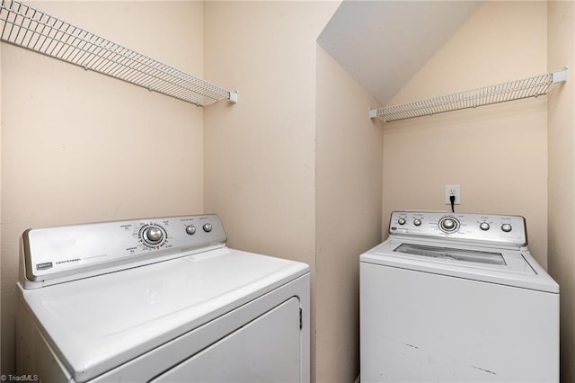 washroom with washer and dryer