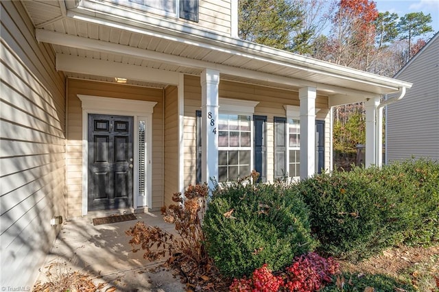 doorway to property featuring a porch