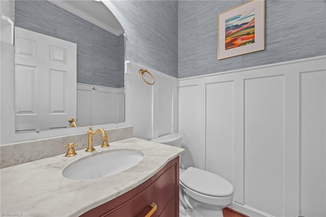 168 Redmeadow Dr, Advance, NC 27006 - bathroom with vanity, a decorative wall, wainscoting, and crown molding