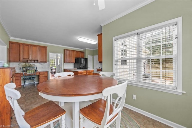 168 Redmeadow Dr, Advance, NC 27006 - dining space featuring crown molding and tile patterned floors
