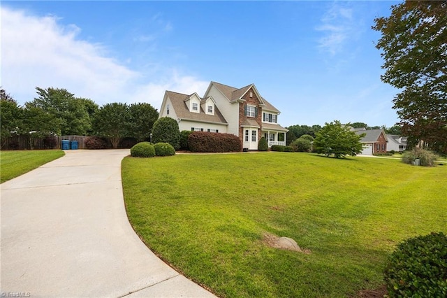 168 Redmeadow Dr, Advance, NC 27006 - view of front of property with concrete driveway and a front yard
