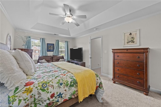 168 Redmeadow Dr, Advance, NC 27006 - bedroom with a tray ceiling, light carpet, ceiling fan, and crown molding