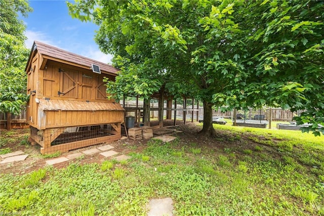 168 Redmeadow Dr, Advance, NC 27006 - view of yard featuring exterior structure and an outbuilding