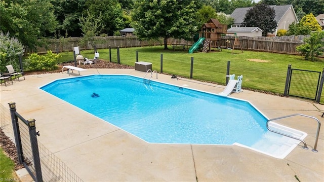 168 Redmeadow Dr, Advance, NC 27006 - view of swimming pool with a fenced backyard, a diving board, and a patio
