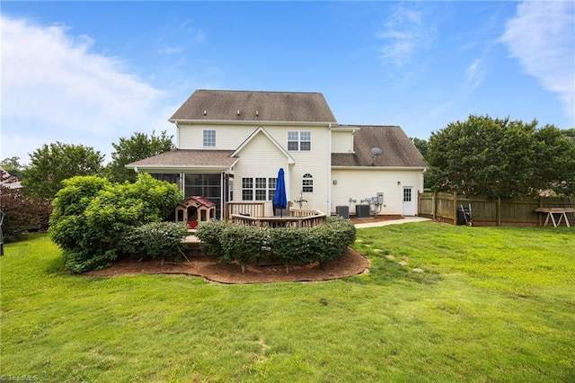 168 Redmeadow Dr, Advance, NC 27006 - back of house featuring a wooden deck and a sunroom