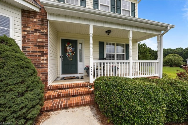 168 Redmeadow Dr, Advance, NC 27006 - property entrance with brick siding and a porch
